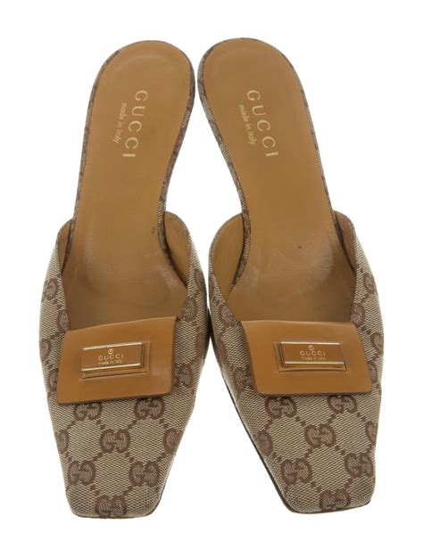 gucci canvas mules.